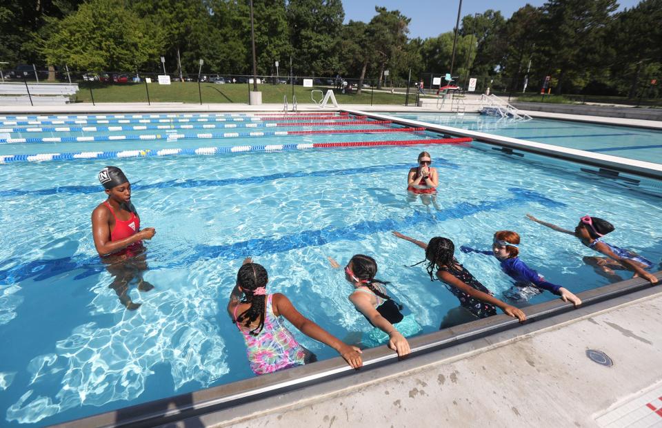 This 2023 file photo shows swim instructor Ny Whyte, with help from swim instructor and lifeguard, Deanna Georgetti, having students line up and get ready for a swim across the lane during their half hour swim lesson at the Genesee Valley Pool @ the Sports Complex in Rochester. The free classes are for ages 6 to 17 years.