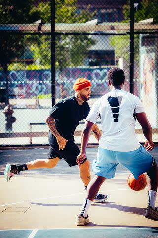 <p>Daniel Granada</p> Nicky Jam playing basketball after undergoing gastric bypass surgery.