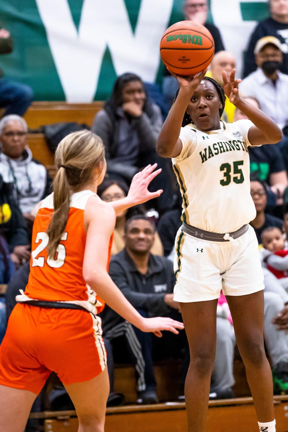 Washington's Monique Mitchell (35) shoots during the Washington vs. Fort Wayne Northrop girls basketball game Wednesday, Jan. 18, 2023 at Washington High School.
