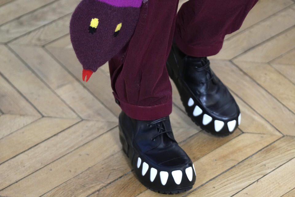 A model wears a creation for Walter van Beirendonck's Menswear ready-to-wear Fall-Winter 2024-2025 collection presented in Paris Wednesday, Jan. 17, 2024 in Paris. (AP Photo/Michel Euler)