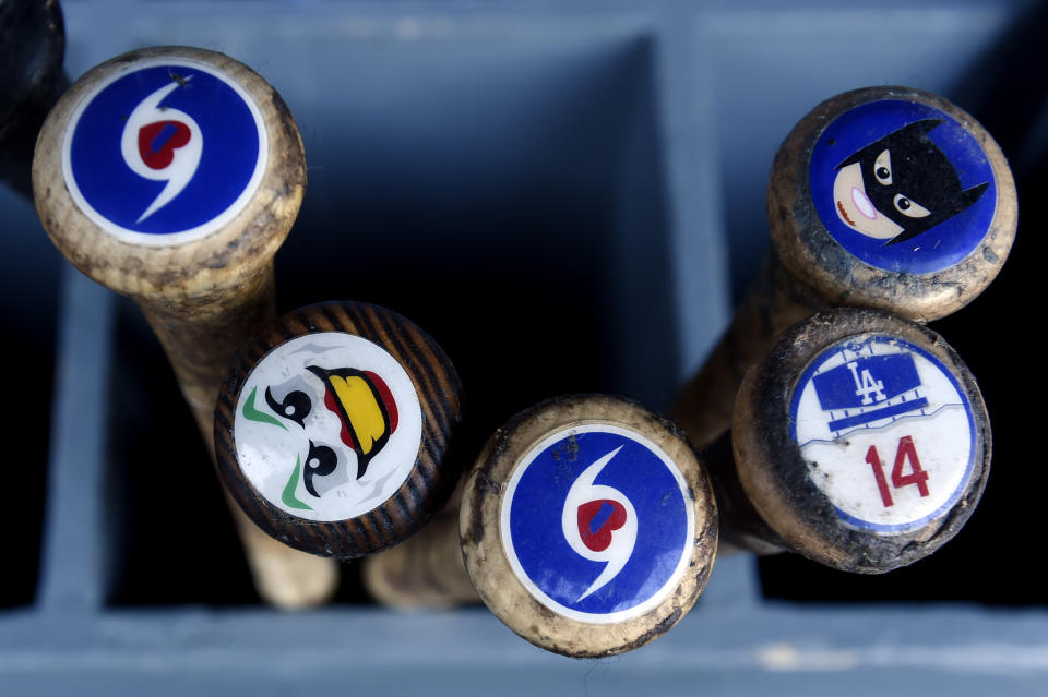 <p>A detail shot of the bats of Enrique Hernandez #14 of the Los Angeles Dodgers in the dugout prior to Game 2 of the 2017 World Series between the Houston Astros and the Los Angeles Dodgers at Dodger Stadium on Wednesday, October 25, 2017 in Los Angeles, California. (Photo by LG Patterson/MLB Photos via Getty Images) </p>