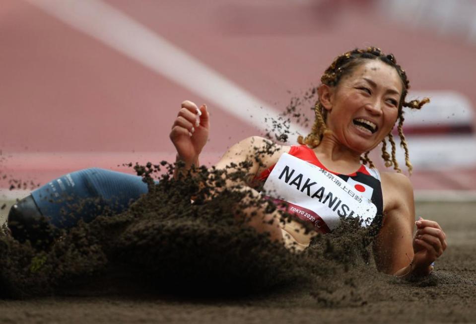 Maya Nakanishi of Japan lands in the Long Jump T64 Final.