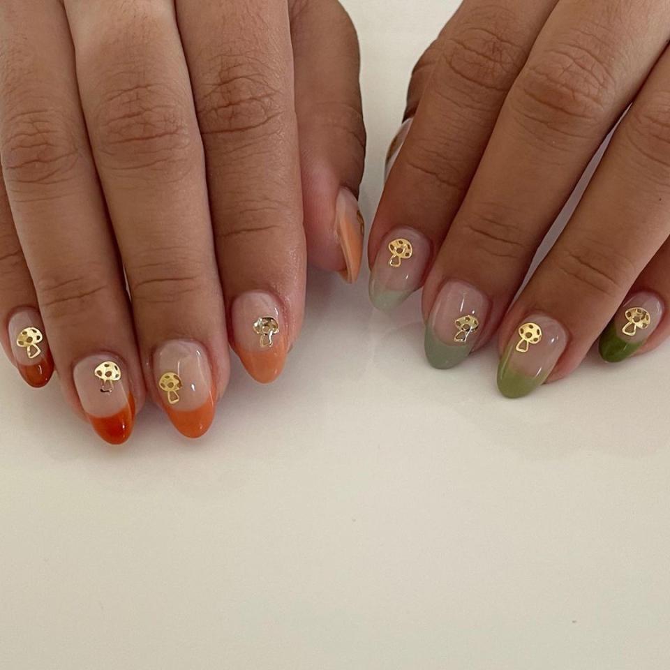 Mushrooms à la the 1970s are having a moment in fashion, so why not wear them on your nails loud and proud? Done in gold and paired with gradient orange and green tips, they’re fall-appropriate.