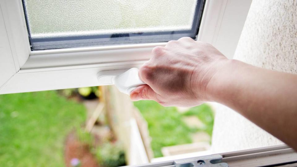 How to get rid of paint smell: Opening a bathroom window