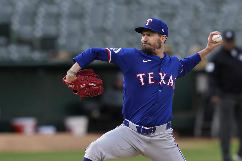 Texas Rangers pitcher Andrew Heaney throws to an Oakland Athletics batter during the first inning of a baseball game Monday, May 6, 2024, in Oakland, Calif. (AP Photo/Godofredo A. Vásquez)