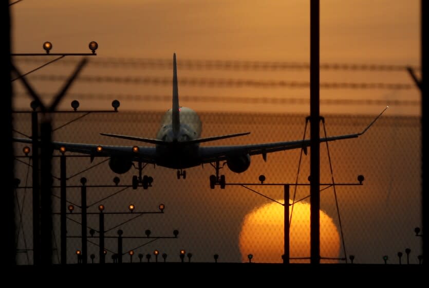 LOS ANGELES, CALIF. -MAR. 4, 2020. The Coronavirus is causing havoc in the travel industry, with United Airlines Holdings Inc. plannig to trim flights, freeze hiring and halt merit pay raises as it grapples with a swift drop in travel demand. (Luis Sinco/Los Angeles Times)