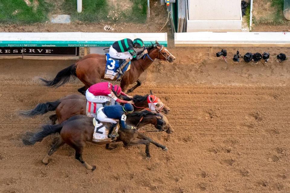 Mystik Dan, top with Brian Hernandez Jr. up, wins the 150th Kentucky Derby.