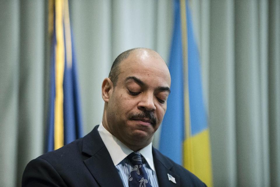 FILE – In this Feb. 10, 2017, file photo, Philadelphia District Attorney Seth Williams speaks during a news conference in Philadelphia. A law enforcement official with direct knowledge of the investigation says the FBI and IRS will announce corruption charges Tuesday, March 21, 2017, against Williams. The charges come after a lengthy investigation into $160,000 in gifts that Williams failed to report, including a new roof, a $2,700 couch and luxury vacations. (AP Photo/Matt Rourke, File)