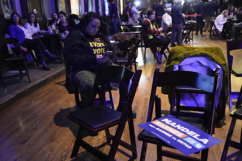 A supporter waits for Wisconsin Democratic U.S. Senate candidate Mandela Barnes to speak at his election night party early Wednesday, Nov. 9, 2022, in Milwaukee. (AP Photo/Morry Gash)