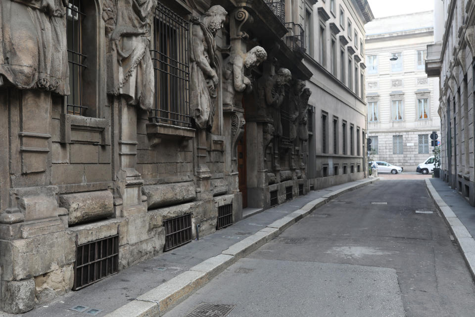 Via degli Omenoni in the city centre is seen empty during the outbreak.