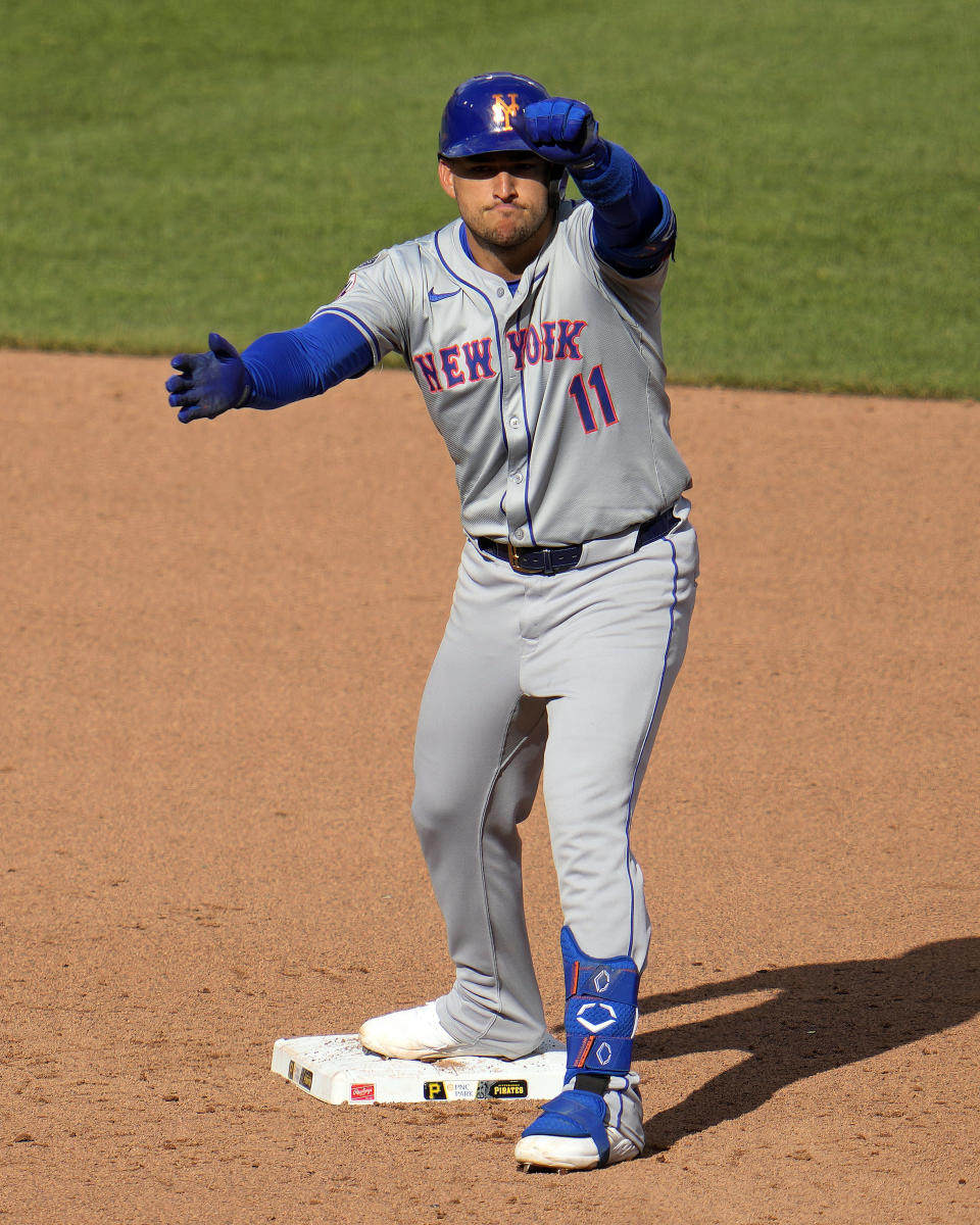 New York Mets' Jose Iglesias celebrates as he stands on second base after driving in a run with a double off Pittsburgh Pirates relief pitcher Ryder Ryan during the sixth inning of a baseball game in Pittsburgh, Saturday, July 6, 2024. (AP Photo/Gene J. Puskar)