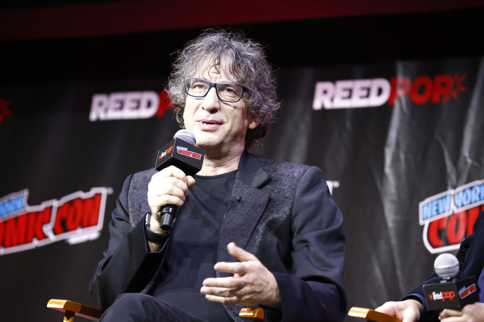 NEW YORK, NEW YORK - OCTOBER 07: Neil Gaiman speak onstage at the Prime Video Presents: Good Omens panel during New York Comic Con 2022 on October 07, 2022 in New York City. (Photo by Paul Morigi/Getty Images for ReedPop)