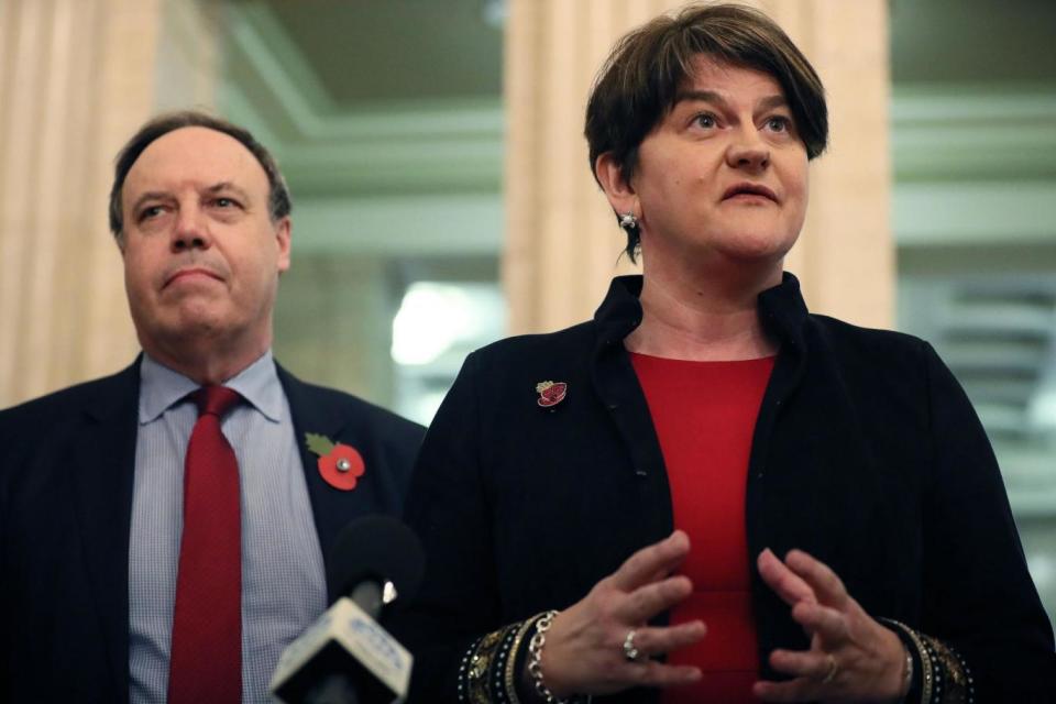 DUP leader Arlene Foster (right) and deputy leader Nigel Dodds speaking to the media in the Great Hall at Stormont, Belfast (PA Wire/PA Images)