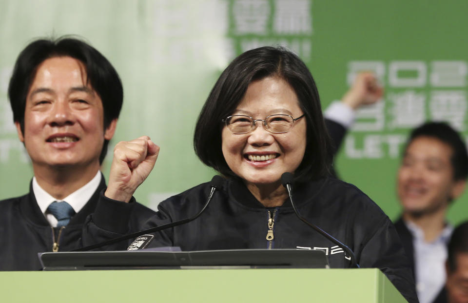 Taiwan's 2020 presidential election candidate, Taiwanese President Tsai Ing-wen celebrates her victory with supporters in Taipei, Taiwan, Saturday, Jan. 11, 2020. Taiwan's independence-leaning President Tsai Ing-wen won a second term in a landslide election victory Saturday, signaling strong support for her tough stance against China. (AP Photo/Chiang Ying-ying)