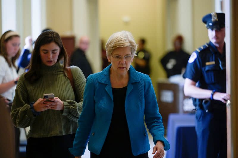 FILE PHOTO: U.S. Senator Elizabeth Warren (D-MA) walks following a Senate Democratic caucus meeting on Capitol Hill in Washington