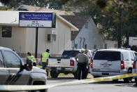 <p>Law enforcement officers gather in front of the First Baptist Church of Sutherland Springs after a fatal shooting, Nov. 5, 2017, in Sutherland Springs, Texas. (Darren Abate/AP) </p>