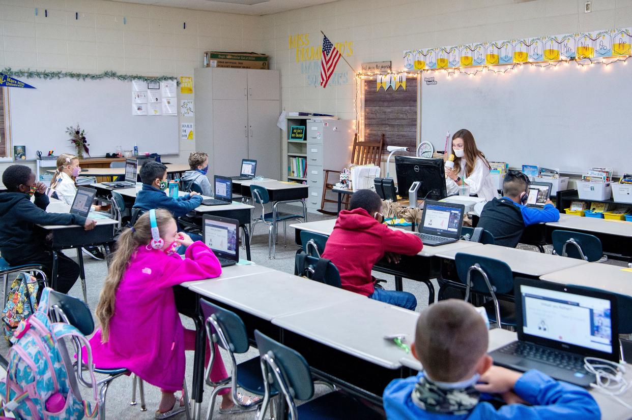 Last week Buncombe County Board of Commissioners member Amanda Edwards called for a statewide teachers strike in response to low salaries and a large state budget surplus. In this 2020 file photo, Caitlyn Drummond teaches her third grade students at Upward Elementary School in Henderson County.
