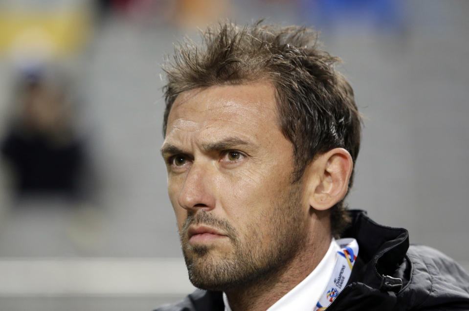 FILE - Tony Popovic, a coach of Australia's Western Sydney Wanderers, watches his players before the Group H soccer match against South Korea's FC Seoul in the Asian Champions League at Seoul World Cup Stadium in Seoul, South Korea, on March 18, 2015. (AP Photo/Lee Jin-man, File)