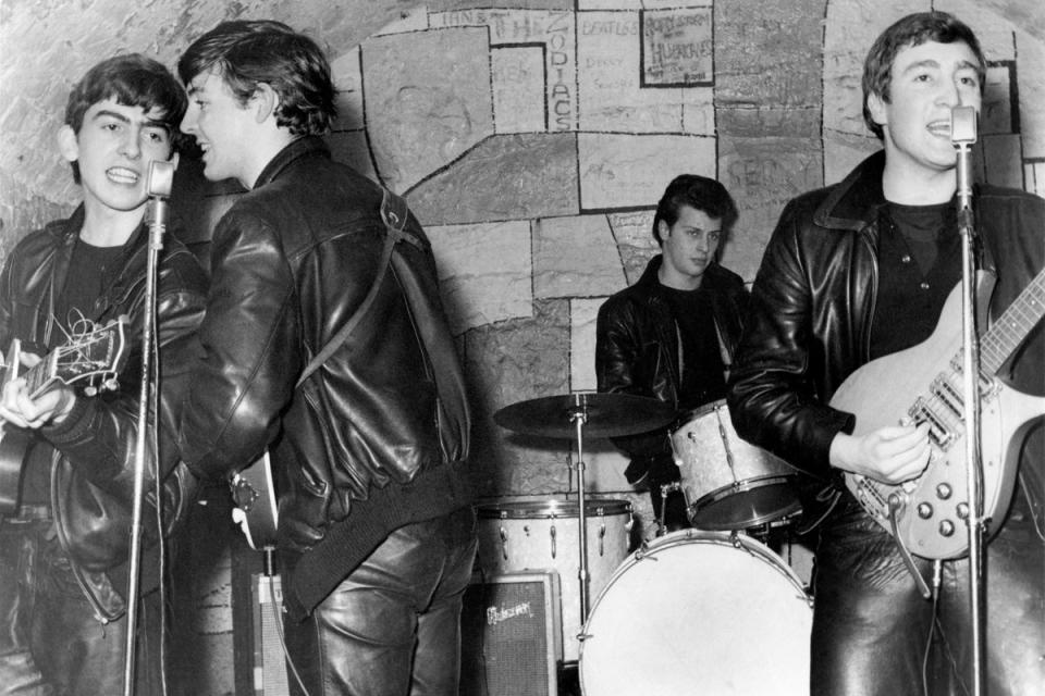 The Beatles performing at the Cavern Club in 1961 (Michael Ochs Archives/Getty Images)