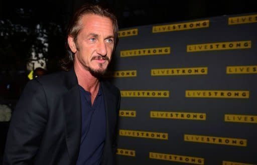 Actor Sean Penn arrives on the yellow carpet for the 'An Evening with Livestrong' gala fundraising event in Austin, Texas, on October 19. Lance Armstrong has admitted to "difficult" times since the release of a report which accused the shamed cyclist of being at the heart of the most sophisticated doping programme ever seen in sport