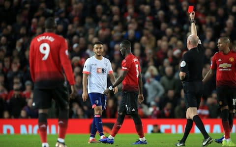 Referee Lee Mason shows the red card and sends off Eric Bailly of Man Utd (C) during the Premier League match between Manchester United and AFC Bournemouth at Old Trafford on December 30, 2018 in Manchester, United Kingdom - Credit: Getty Images