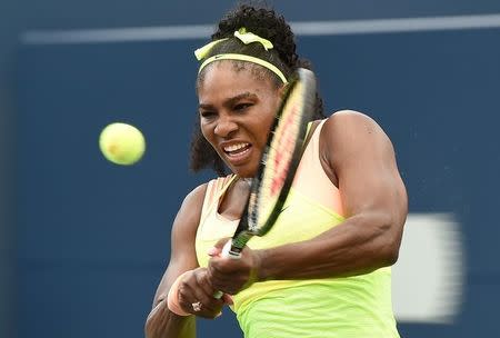 Aug 11, 2015; Toronto, Ontario, Canada; Serena Williams of the United States hits a shot against Flavia Pennetta of Italy (not pictured) during the Rogers Cup tennis tournament at Aviva Centre. Dan Hamilton-USA TODAY Sports