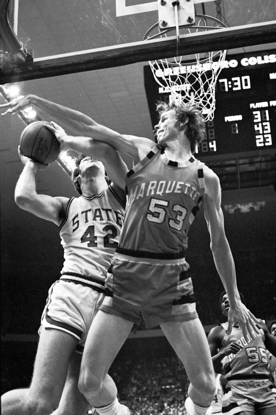 NC State’s Tim Stoddard drives against Marquette’s Rick Campbell in the 1974 National Championship game.