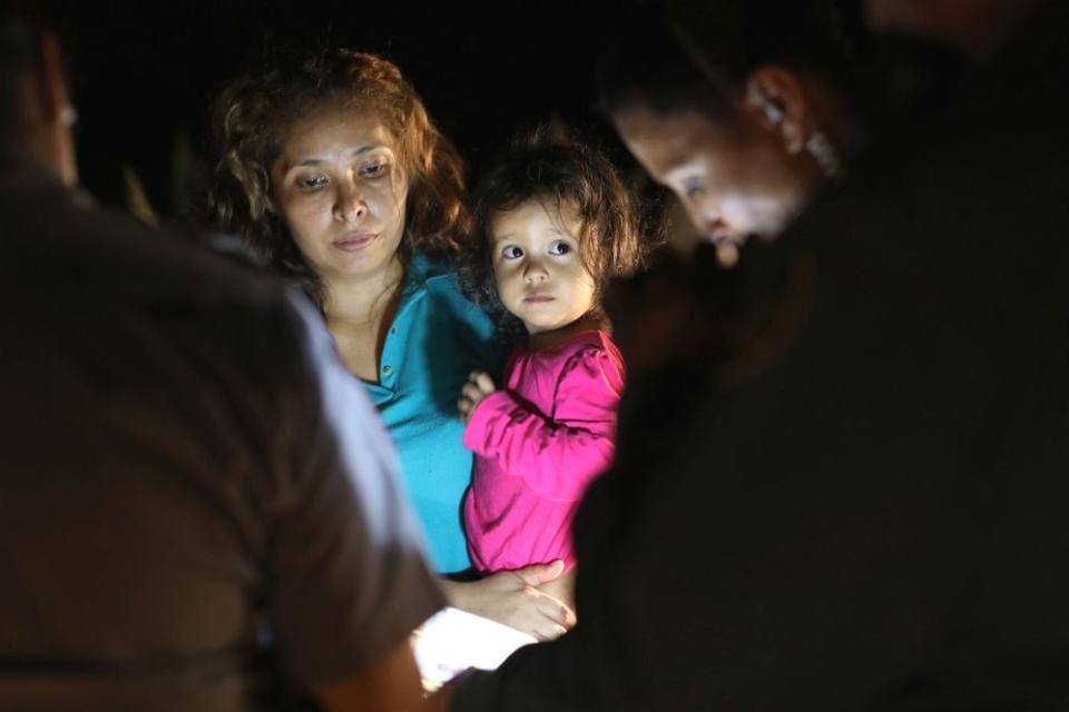 The 2-year-old Honduran girl and her mother are taken into custody near the U.S.-Mexico border on June 12, 2018 in McAllen, Texas