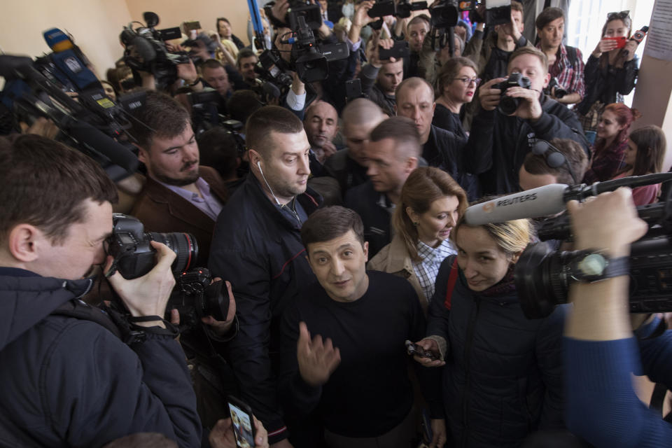 Ukrainian comedian and presidential candidate Volodymyr Zelenskiy, arrives at a polling station, during the presidential elections in Kiev, Ukraine, Sunday, March. 31, 2019. (AP Photo/Emilio Morenatti)