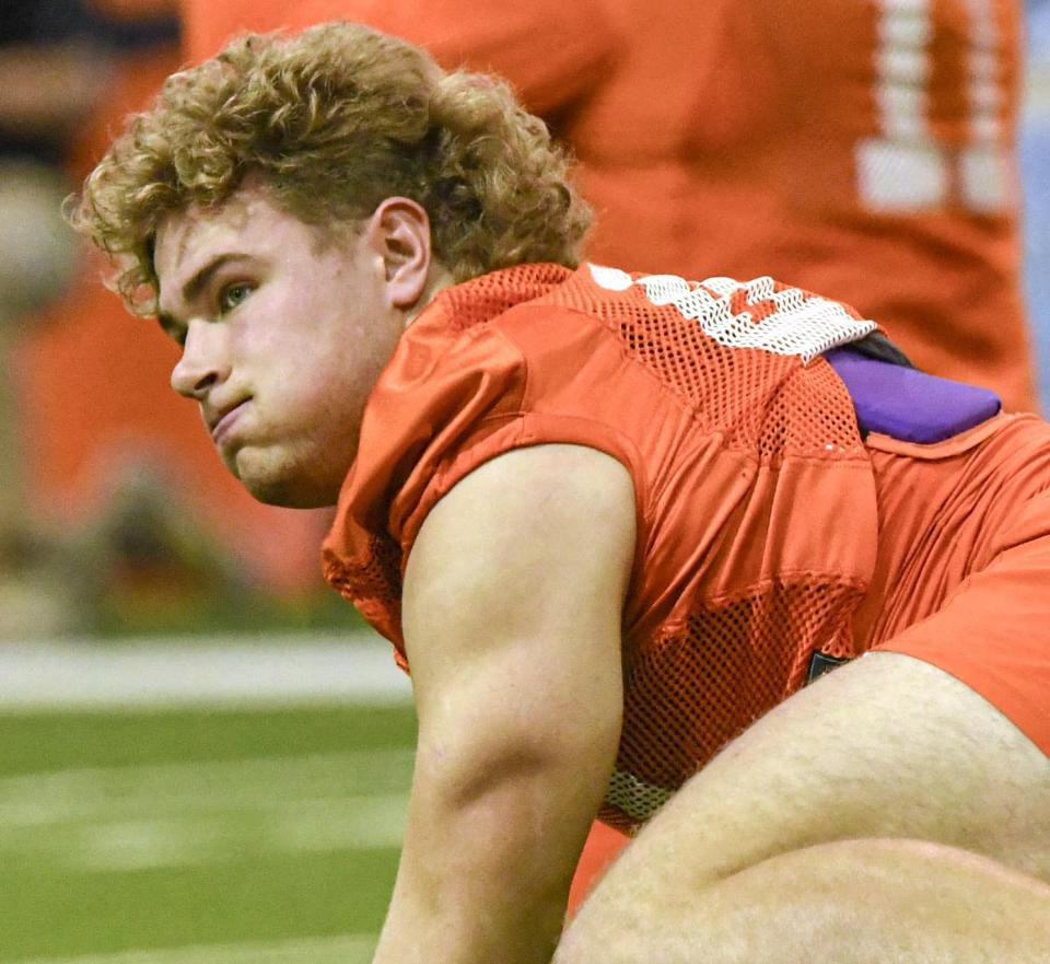 Clemson linebacker Sammy Brown (47) stretches during the first day of Spring practice at the Poe Indoor Practice Facility at the Allen N. Reeves football complex in Clemson S.C. Wednesday, February 28, 2024.