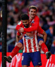 Soccer Football - La Liga Santander - Atletico Madrid vs Athletic Bilbao - Wanda Metropolitano, Madrid, Spain - February 18, 2018 Atletico Madrid's Diego Costa celebrates scoring their second goal with Antoine Griezmann REUTERS/Javier Barbancho