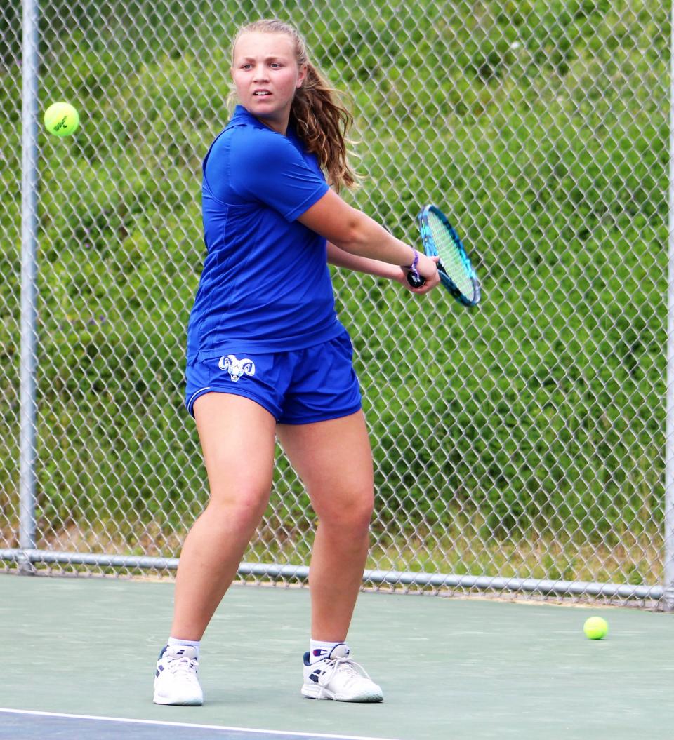 Kennebunk's Olivia Cutone returns a shot during her No. 1 singles match at Saturday's Class A state championship against Brunswick at South Portland High School.