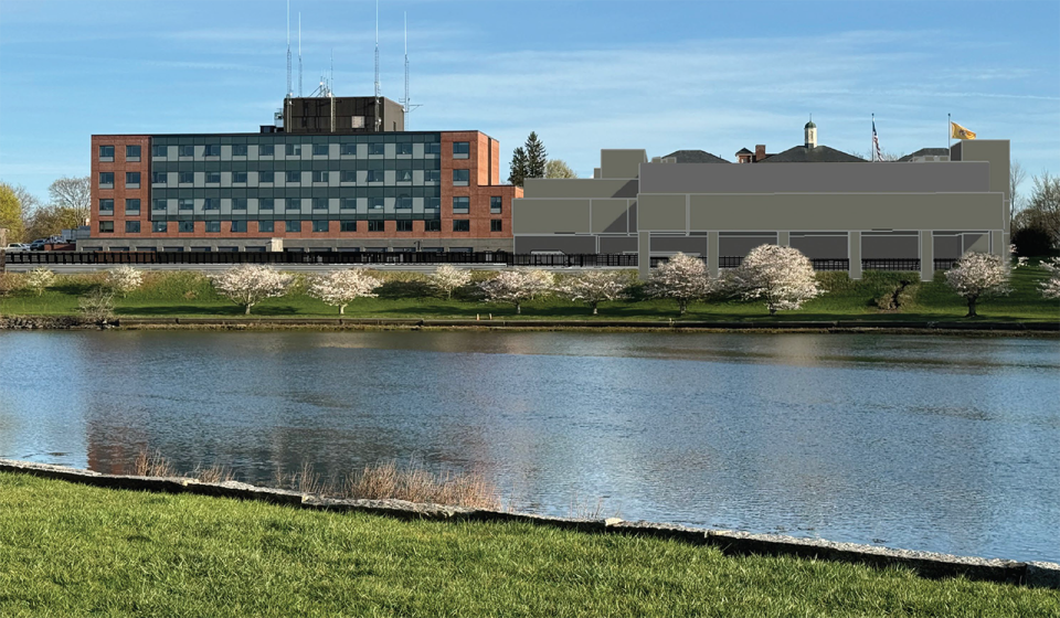 A view of the proposed new Portsmouth police station addition at the existing City Hall complex from across South Mill Pond.