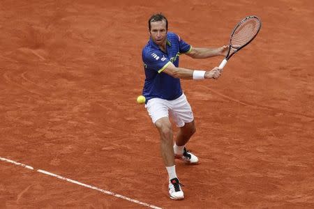 Tennis - French Open - Roland Garros - Radek Stepanek of the Czech Republic vs Andy Murray of Britain - Paris, France - 24/05/16. Radek Stepanek prepares to return the ball. REUTERS/Benoit Tessier