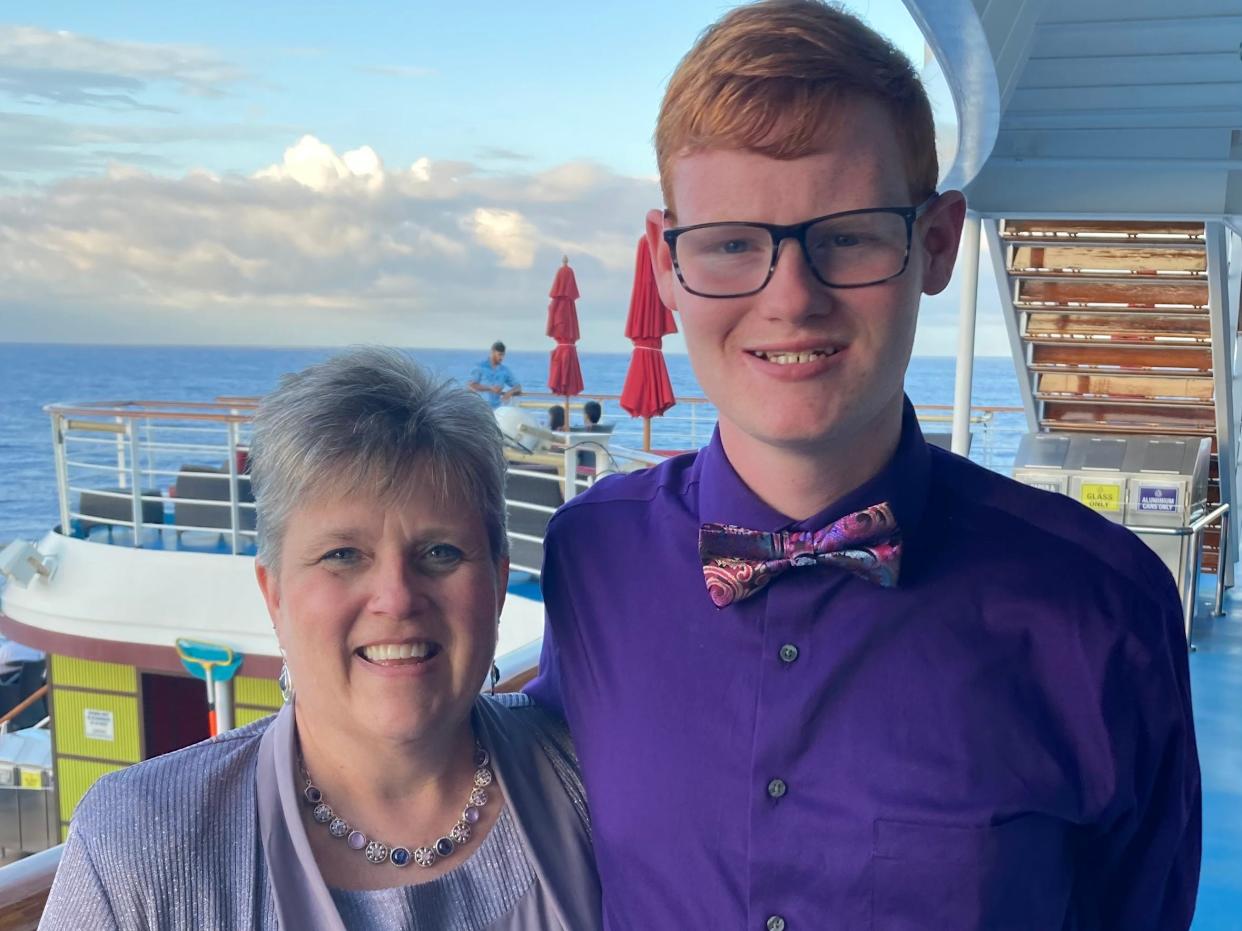 Dee Marks and her son, CJ, on a cruise in 2022
