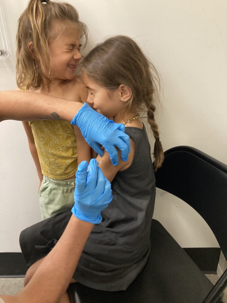 Carli Pierson's older daughter gets her second dose of the COVID-19 vaccine in August 2022.