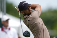 Xander Schauffele watches his tee shot on the 10th hole during the first round of the Wells Fargo Championship golf tournament at the Quail Hollow Club Thursday, May 9, 2024, in Charlotte, N.C. (AP Photo/Erik Verduzco)