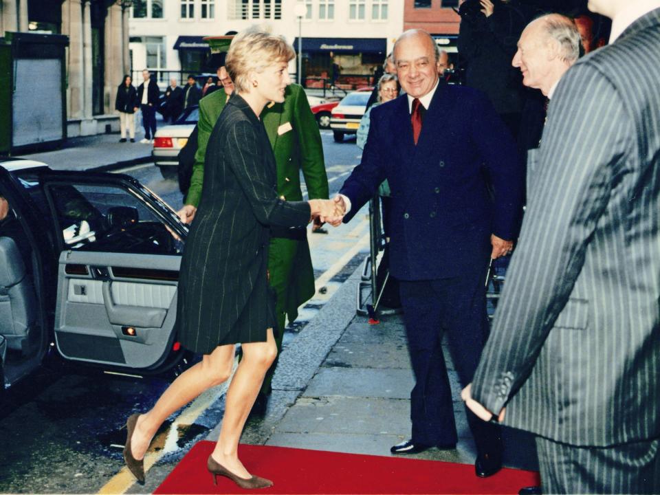Princess Diana shaking hands with Mohamed Al-Fayed at Harrods on October 16, 1996.