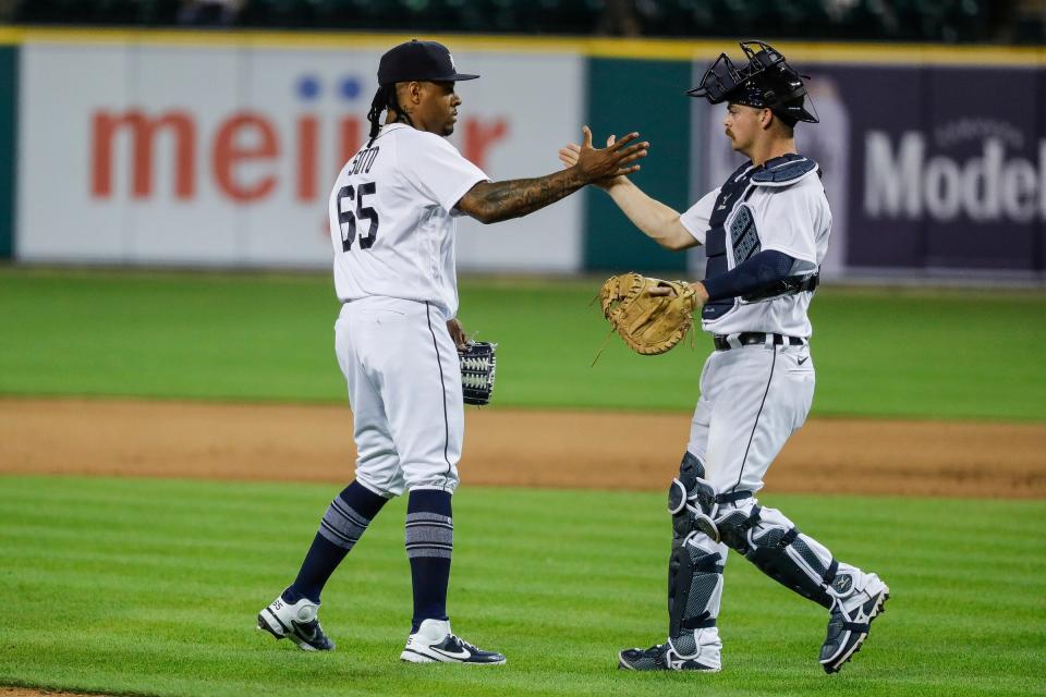 Detroit Tigers pitcher Gregory Soto (65) celebrates with catcher Jake Rogers (34) after the Tigers' 1-0 win over Cleveland at Comerica Park in Detroit on Wednesday, May 26, 2021.