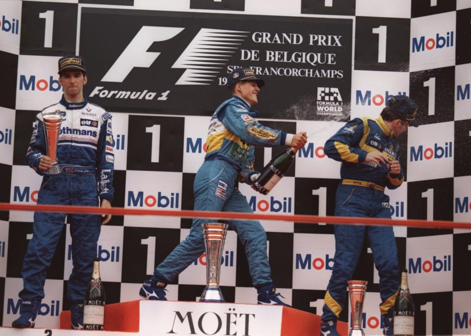 <b>BELGIUM 1995</b><br><br> A victory from 16th place on the starting grid in changing conditions and with the German staying out on slick tyres in the wet. The outcome was tainted by controversy, with Schumacher given a suspended one-race ban for weaving on the straights to prevent Damon Hill overtaking.