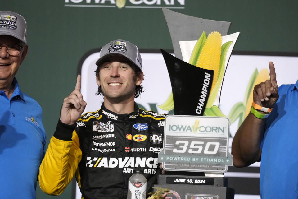Ryan Blaney celebrates in victory lane after winning a NASCAR Cup Series auto race, Sunday, June 16, 2024, at Iowa Speedway in Newton, Iowa. (AP Photo/Charlie Neibergall)