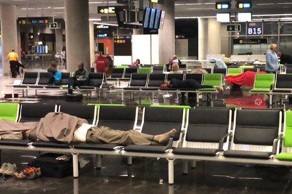 Bedding down: the scene from Las Palmas airport where stranded Tui passengers spent another night: Anonymous