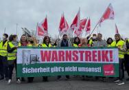 FILE PHOTO: Security staff of Frankfurt airport strike