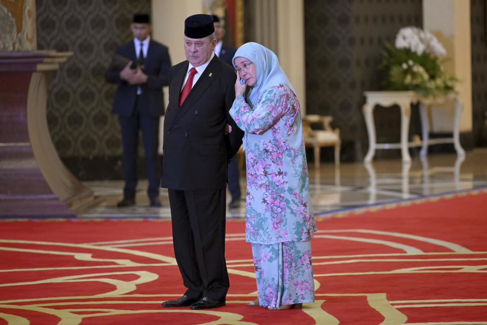 Malaysia's Queen Tunku Azizah Aminah Maimunah Iskandariah, right, hugs her brother Sultan Ibrahim Iskandar of Johor after the election for the next Malaysian king at the National Palace in Kuala Lumpur Friday, Oct. 27, 2023. Malaysia's royal families have elected the powerful and wealthy ruler of southern Johor state as the country's new king under a unique rotating monarchy system, the palace said Friday. Sultan Ibrahim Iskandar, 64, will ascend to the throne on Jan. 31 for a five-year term. the palace said in a statement (Mohd Rasfan/Pool Photo via AP)