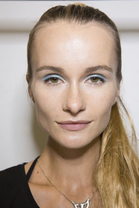 <p><strong>How to keep the noughties at bay...</strong> Stick to one rule - up or down. Yup, it's all about either applying pastel blue eyeshadow in a clean dome shape on your upper eyelid, <em>or</em> drawn along your lower lash line with a smudgy finish. But bring the two together and be warned, you're in pastel noughties-ville and just a handkerchief top away from a make-up faux pas.</p><p><strong>Try...</strong><a rel="nofollow noopener" href="https://www.net-a-porter.com/gb/en/product/490176/RMS_Beauty/cream-eye-polish-inspire" target="_blank" data-ylk="slk:RMS Beauty Cream Eye Polish in Inspire - £26;elm:context_link;itc:0;sec:content-canvas" class="link ">RMS Beauty Cream Eye Polish in Inspire - £26</a></p>