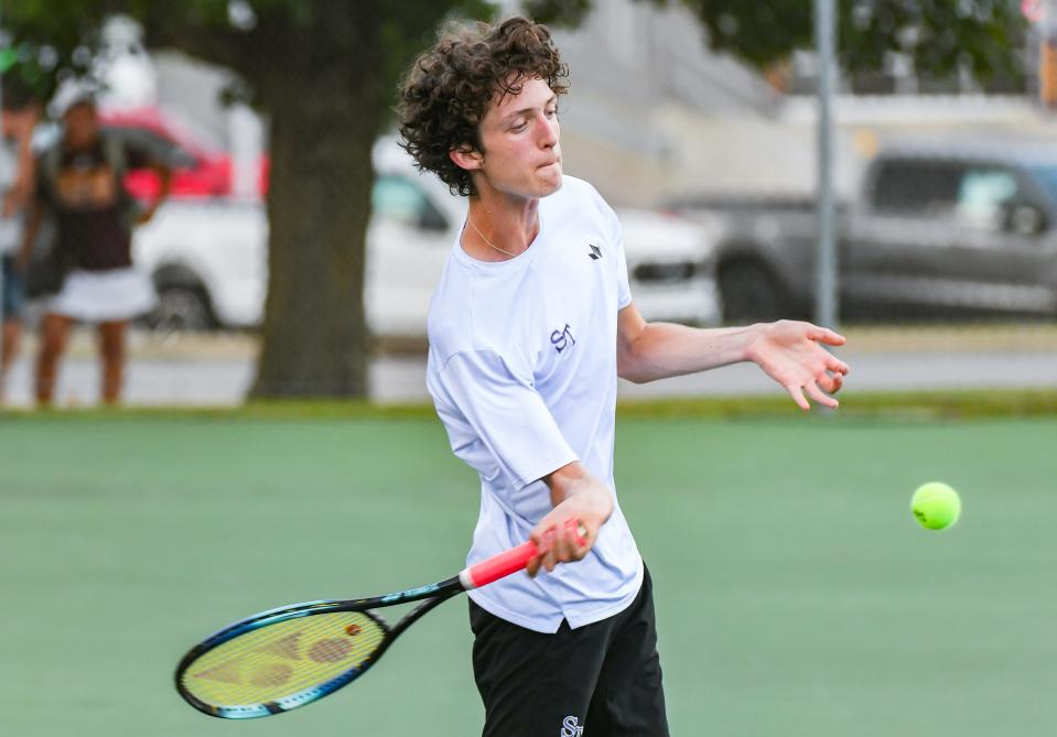 Bloomington South’s David Ciucu hits a shot during his No. 1 singles match against Bloomington North’s Connor O’Guinn during the tennis match at South on Tuesday, September 5, 2023.