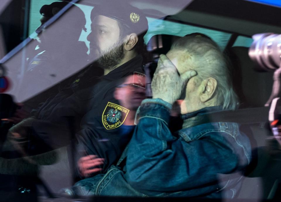 Josef Fritzl is escorted  back to a prison after his hearing at the regional court in Krems an der Donau, Austria (AFP via Getty Images)