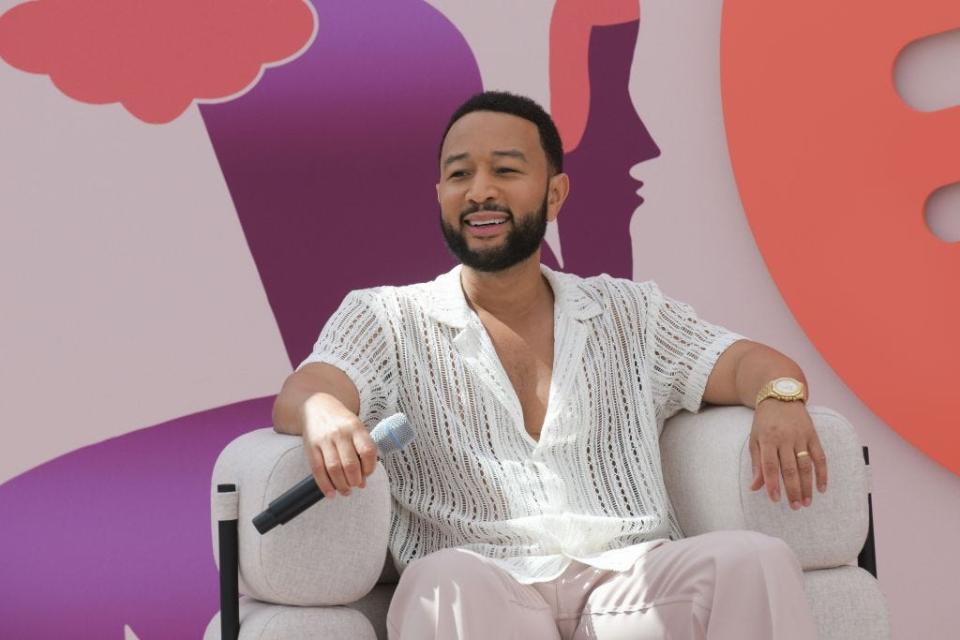 John Legend speaking at an event