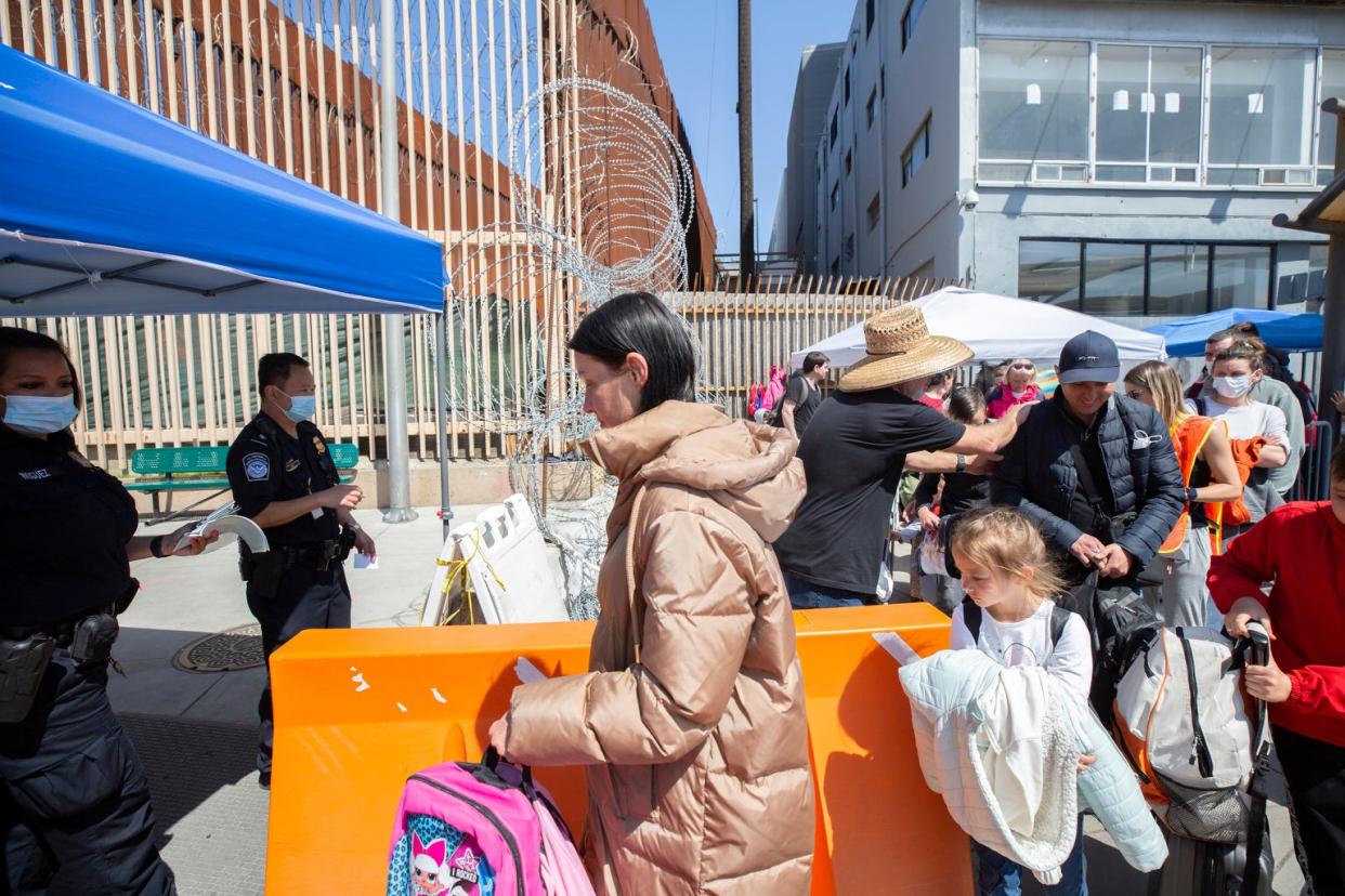 Ukrainian refugees are allowed to enter the U.S. by Customs and Border Protection at the San Ysidro Port of Entry in Tijuana, Baja  California on April 5, 2022. 