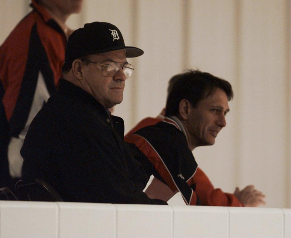 9/10/97-TRAVERSE CITY RED WINGS--Red Wings Head Coach Scotty Bowman, left, and new general manager Ken Holland watch the Wings' first skate on Sept. 10, 1997.